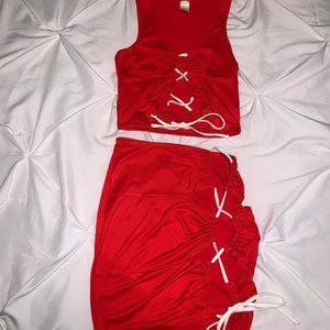 Two-piece lace-up set. Red/Orange, size Small